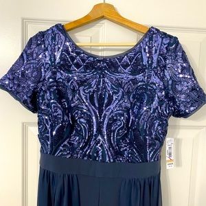 Brand new with tags, size 12. This is a romper dress